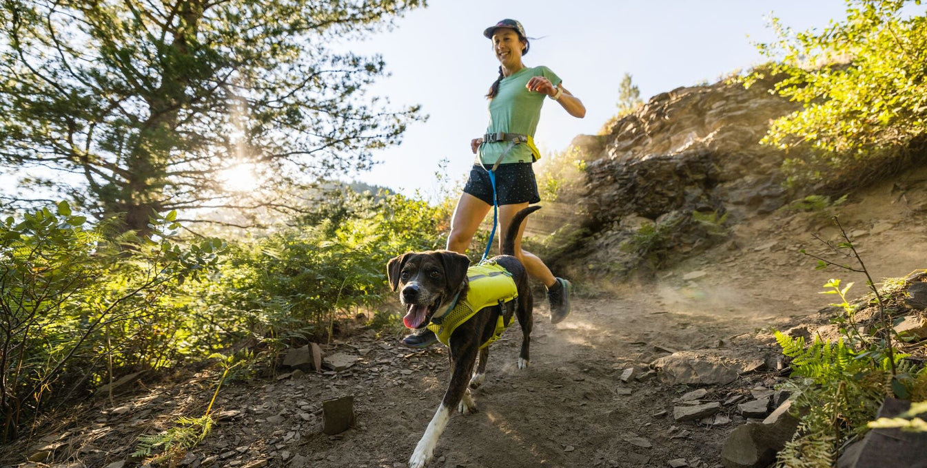 Woman running with her dog.