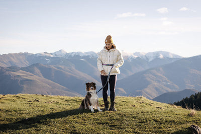 Naia and Rose stand infront of a beautiful Vista in the French Alps.